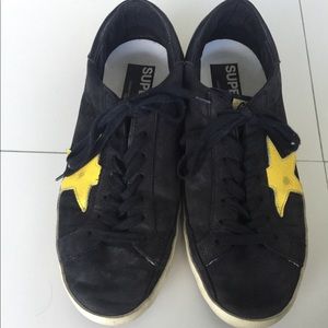 Golden Goose black and yellow sneakers